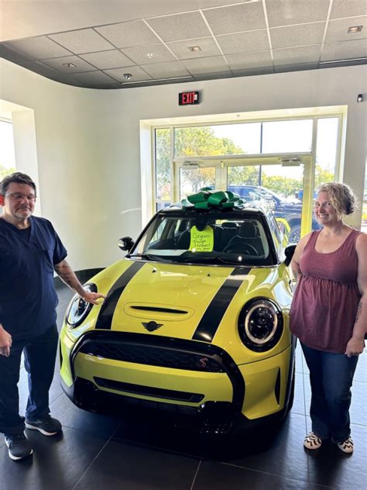 Carey with his Mini Cooper