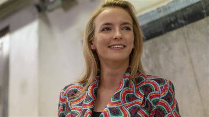 Jodie Comer's pet Holding Dogs (Jodie Comer)
