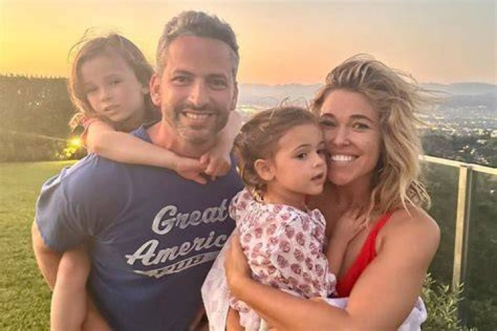 Violet Skye Lazan with her parents
