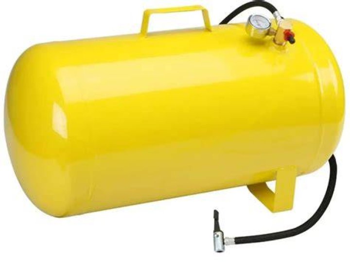 When should air tanks be drained?